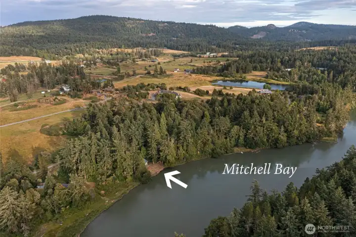 Prime Mitchell Bay location offering convenient access to Roche Harbor, English Camp, boating, hiking trails, and the natural beauty of San Juan Island.