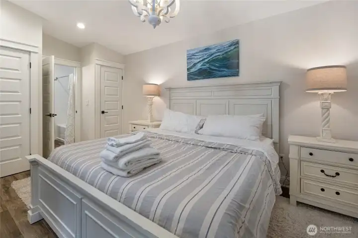 Bedroom connects conveniently to the updated bathroom while maintaining easy access to the home's main living spaces.