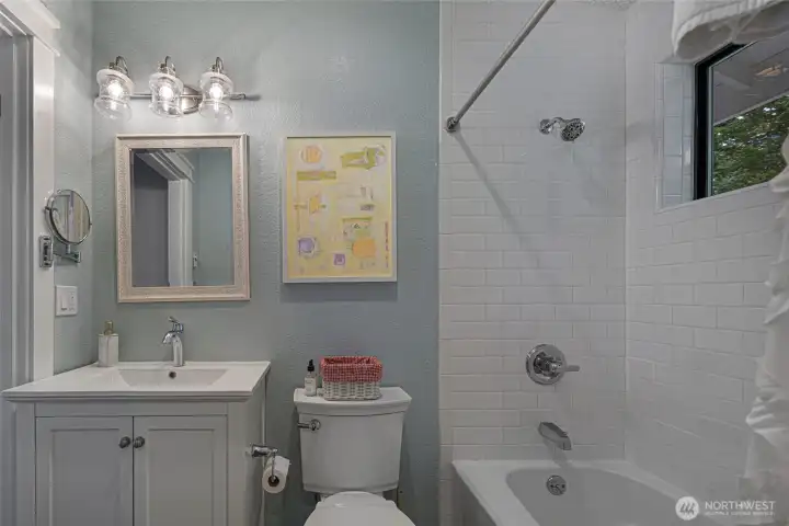 Bright and refreshed bathroom with contemporary finishes, neutral color palette, and easy-maintenance design.