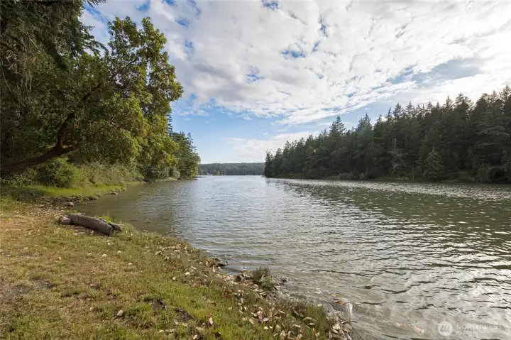 Relax along the private shoreline and enjoy serene bay views, ideal for launching kayaks, wildlife watching, or simply enjoying island waterfront living.