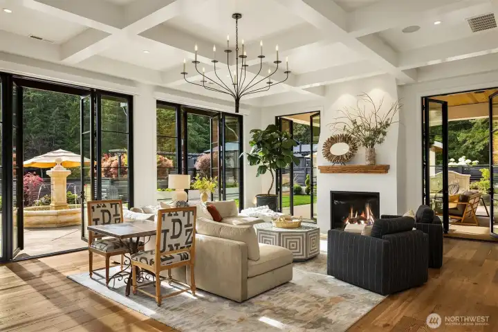 Great room with views onto the courtyard also features a gas fireplace with Venetian plaster surround.
