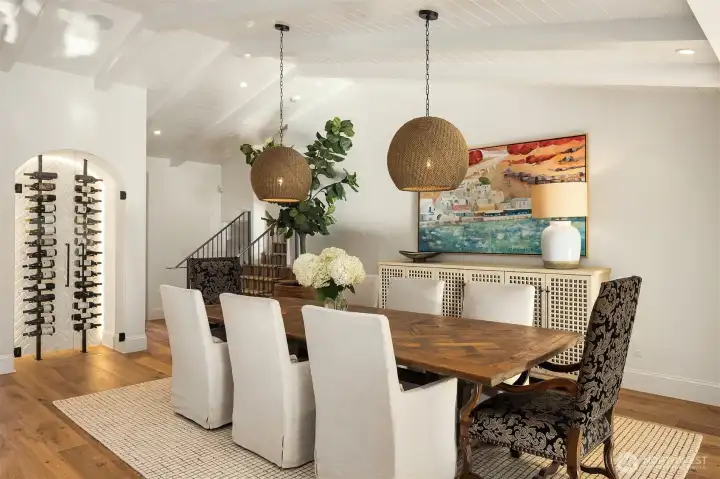 Dining room features Palacek lighting and wine storage with backlighting.