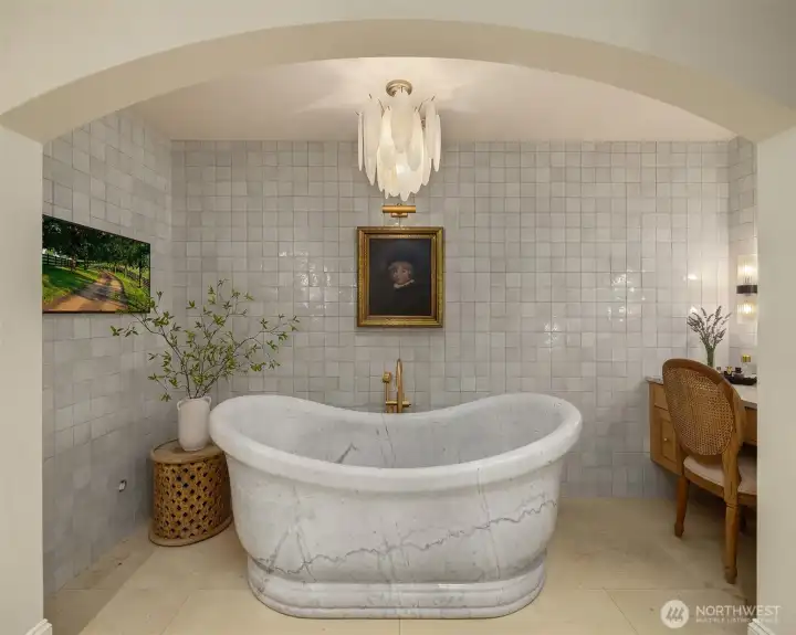 Primary bath also features a dedicated dressing vanity.