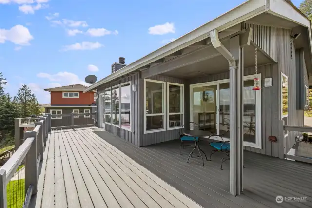 Trex decking runs 3/4 length of house on water side with spectacular views of water, Mountain and ferries.
