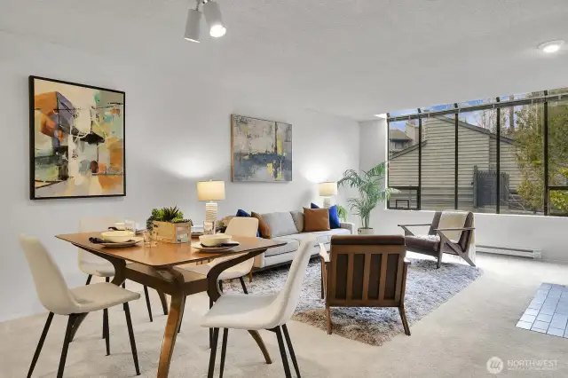 Large open concept living room with oversized North facing windows.