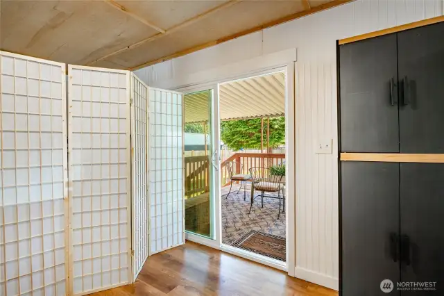 Sliding glass door to the covered deck