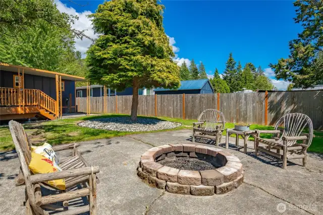 Great firepit with surrounding patio to enjoy being outdoors