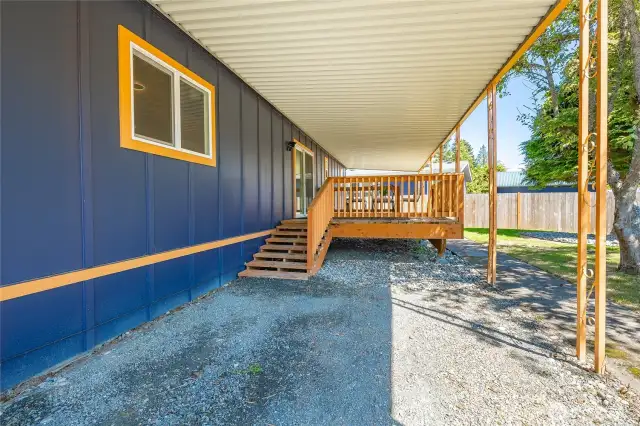 Covered parking with entry to kitchen area