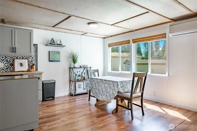 Dining area is light and bright.