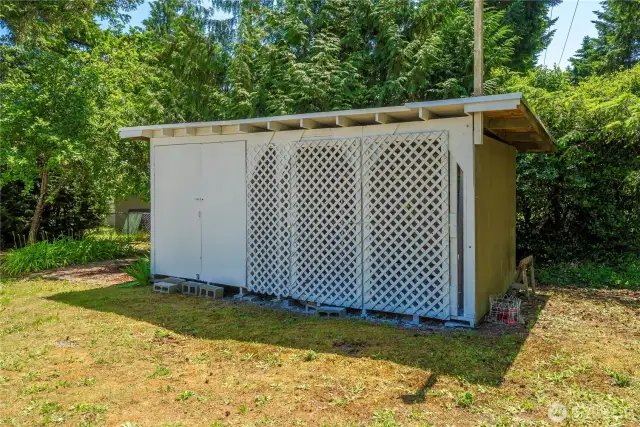 Another shed offering storage for your tools and wood for the woodstove.