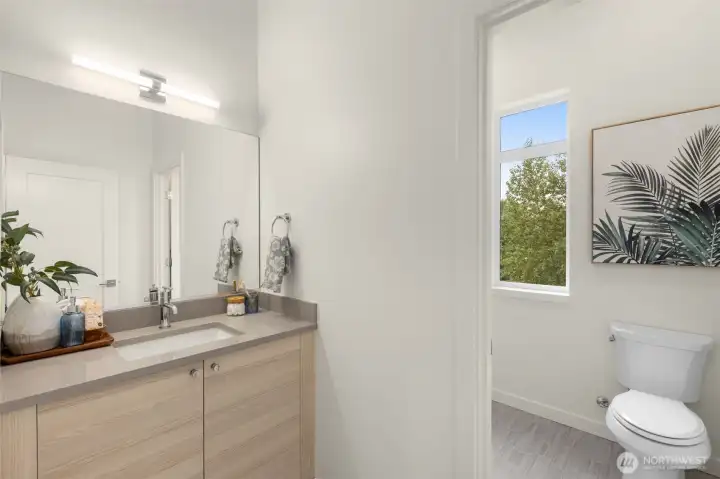 One of the ensuite guest bathrooms featuring contemporary finishes and stylish fixtures.