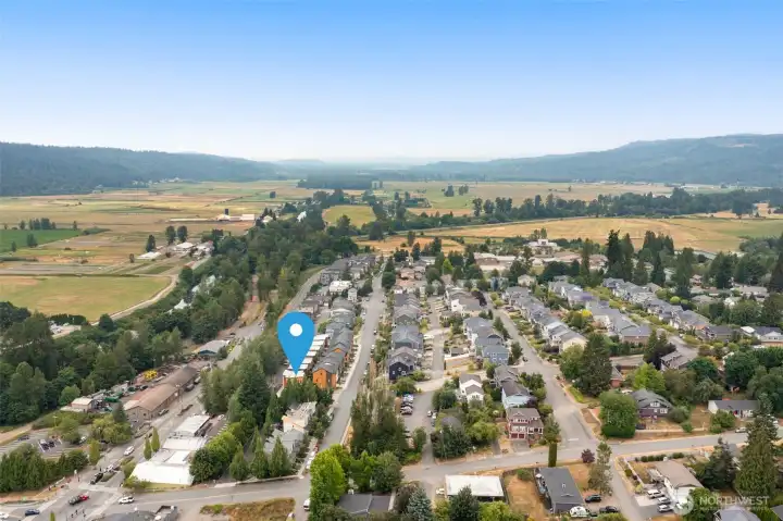 Beyond the rooftops lies your backyard: rolling hills, river walks, and mountain-bound weekends.