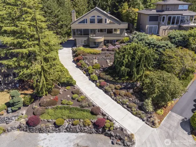 You benefit from the recently installed all concrete driveway which replaced the black top one.