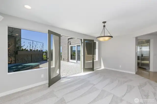 The family room walks out to the side deck.