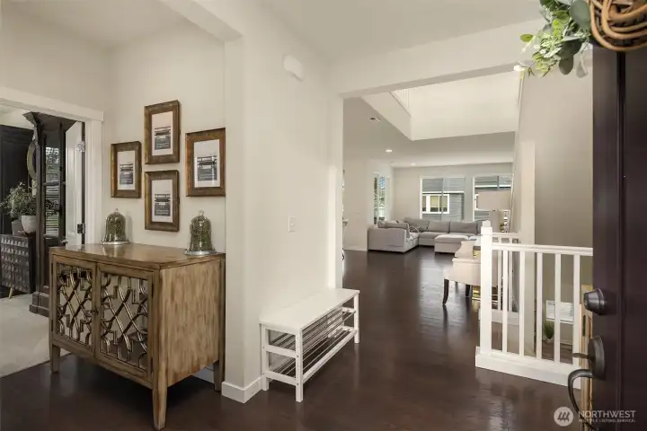 Welcome home: gleaming hardwood throughout main floor, vaulted ceilings