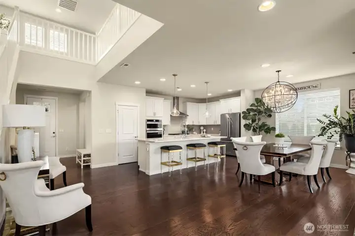 Abundance of spaces: light filled open floor plan - seamless transition from the kitchen to the dining and family rooms.