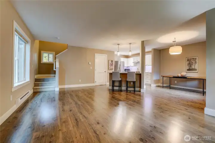 View of the living room and kitchen from entry