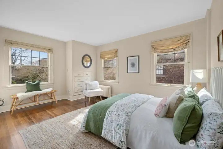 Bedroom four with windows facing east and south