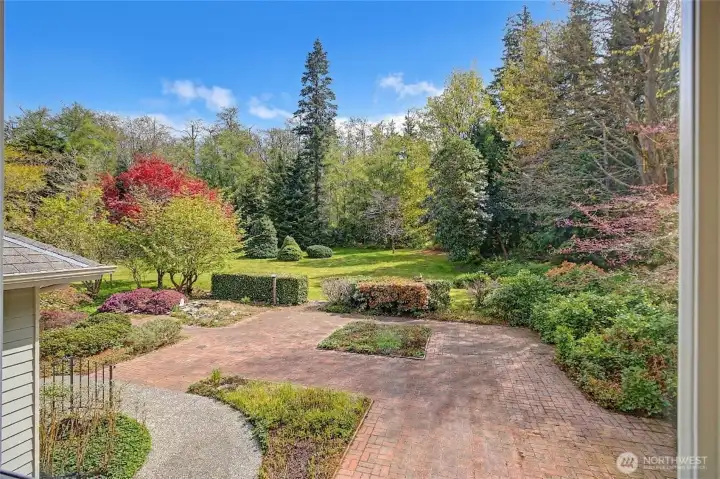 Brick courtyard picture taken from inside the home.  My oh my!  what a view!  This could be your next home.