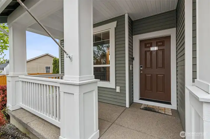 Really love this covered front porch, this home feels new inside and out.