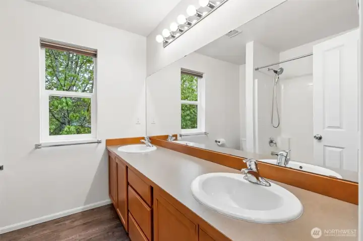 Upstairs kids/guest full bath. Double vanity is a really nice feature.