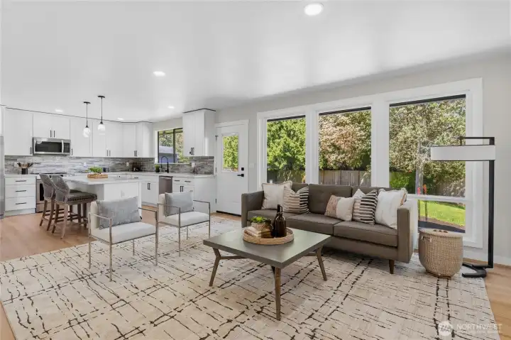 This newer vinyl windows looking out to the huge well groomed back yard bring so much natural light into this open floor plan. This newer vinyl windows looking out to the huge well groomed back yard bring so much natural light into this open floor plan.