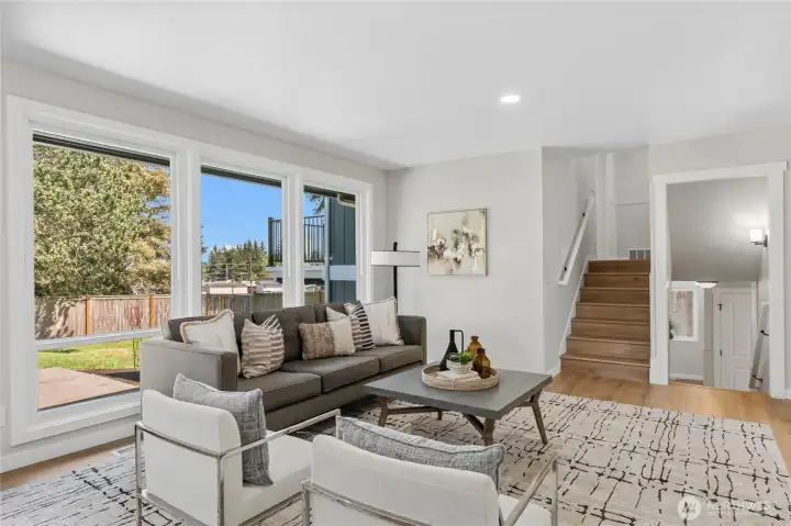 Family room off the kitchen also leads to up to Master Suite, additional main full bath and 3 extra bedrooms. Family room off the kitchen also leads to up to Master Suite, additional main full bath and 3 extra bedrooms.