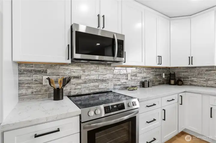 Gorgeous subway tile and Stainless Steel appliances. Gorgeous subway tile and Stainless Steel appliances.