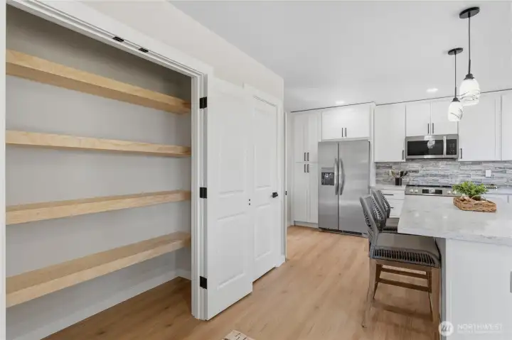 Custom shelving in one of the pantry's. Custom shelving in one of the pantry's.