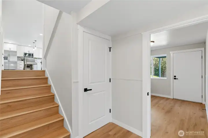 Stairs leading up to the main floor from the bottom tri-level and offers 4 extra room, utility room and 3/4 bath. Stairs leading up to the main floor from the bottom tri-level and offers 4 extra room, utility room and 3/4 bath.