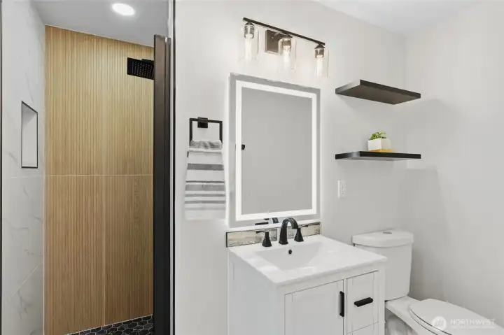 Completely updated master bath with LED mirrow and trendy shower. Completely updated master bath with LED mirrow and trendy shower.