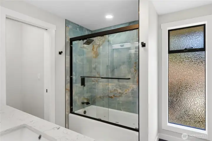 This stunning main bath with beautiful tile surround. This stunning main bath with beautiful tile surround.