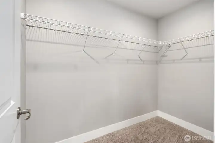 Huge primary walk in closet Huge primary walk in closet