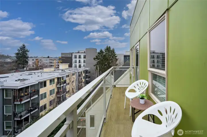 spacious deck on the quiet, cool side of the building