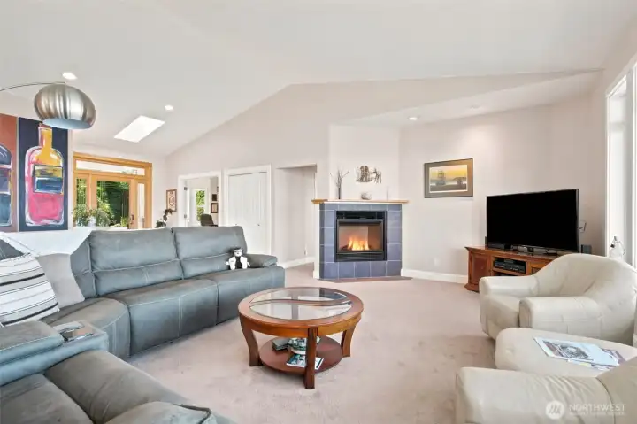 MAIN HOUSE living room with gas fireplace & slate surround.