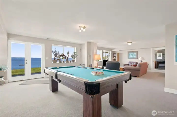 MAIN HOUSE - lower level family room with water and mountain views.