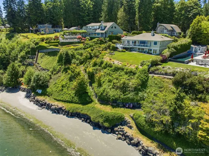 Medium-bank waterfront with private steps to beach.