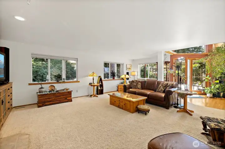 Living Room Connects to French Doors to Deck Living Room Connects to French Doors to Deck