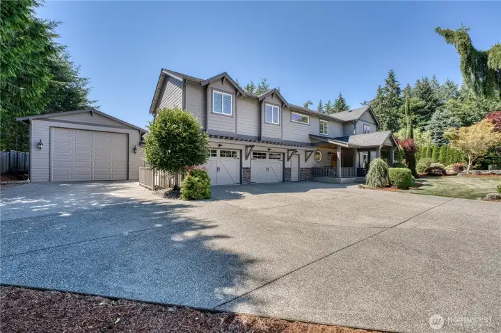 Nearly 1,500 sq ft shop fits large RV and pleanty of additional room for hobbies.  Home has covered parking for 6 with additional parking for 10 plus exterrior RV parking with dump and 220-volt as well.