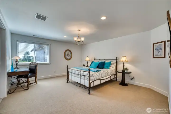 Guest bedrooms are extra large with lots of natural light.