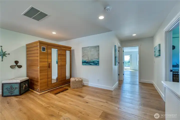 View of the upstairs bonus room.  There is engineered hardwood flooring throughout most of the home.