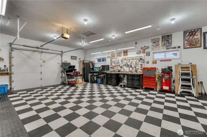 Open the back garage door while working to take in the view or for drive through convenience.  This shop has so many possibilities.