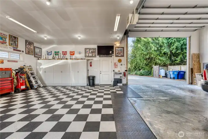 With the shop and attached garages there is covered parking for up to 6 cars and an additional parking for 10 outside as well.