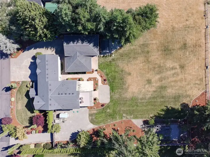Overhead view of the property and all of the ammenities.  So many great features just imagine yourself here on this large private lot.