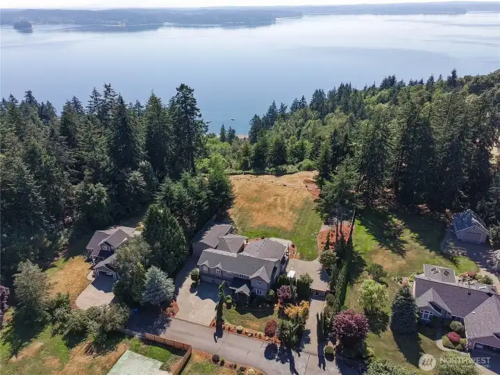 Welcome home to Cedrona Estates, a quiet gated community on Fox Island.