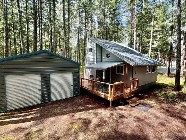 Two car garage and handy storage for all the lake toys and wonderful sun shade for the summer months on the deck. Dog run too!