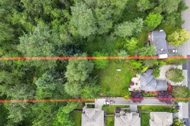 1.3 acres of property; west portion of this & adjoining properties are native growth areas which assure your privacy. Red lines are approximate boundary lines