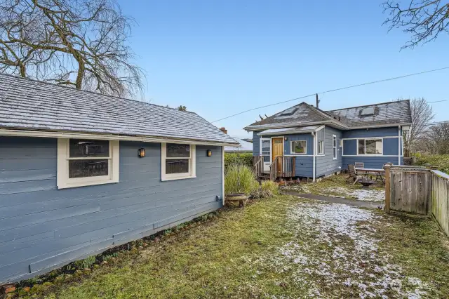 Open fenced area in backyard.