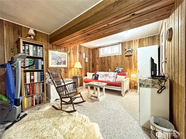 This cozy space is a great rec room, guest area