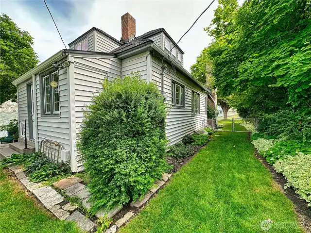Side yard with large accessibility gate